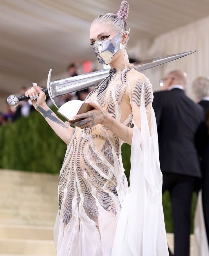 Grimes's Met Gala look as she was alone on the red carpet